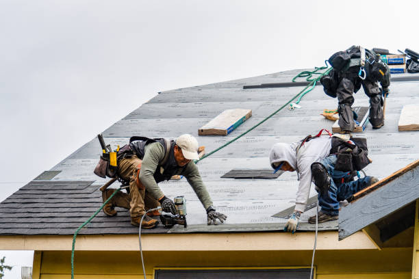 Professional Roofing technician working in Rochester, MA